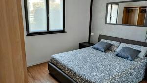 Postel nebo postele na pokoji v ubytování FabysHouse Appartamento in Villa
