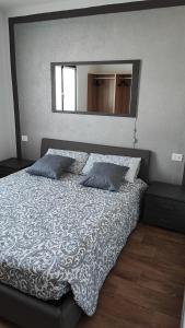 Postel nebo postele na pokoji v ubytování FabysHouse Appartamento in Villa
