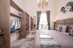 Ένα ή περισσότερα κρεβάτια σε δωμάτιο στο Ta' Dun Martin and taz-Zija Bed and Breakfast +74 φωτογραφίες