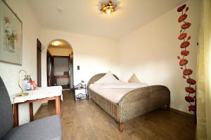 Postel nebo postele na pokoji v ubytování Hotel Zrenners GARNI