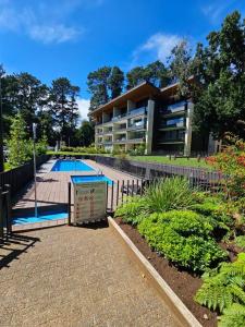 Swimmingpoolen hos eller tæt på Departamento Parque Pinares Pucón Playa Privada