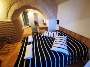 Postel nebo postele na pokoji v ubytování Albachiara Room
