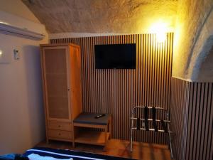 TV a/nebo společenská místnost v ubytování Albachiara Room