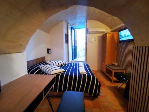 TV a/nebo společenská místnost v ubytování Albachiara Room