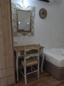 A bed or beds in a room at Green House Skiathos