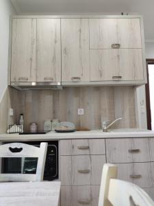 A kitchen or kitchenette at Green House Skiathos