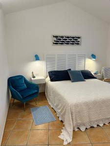 Postel nebo postele na pokoji v ubytování Casa Emy, Porto Ottiolu