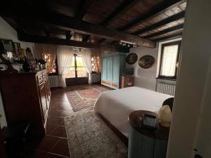 Postel nebo postele na pokoji v ubytování Cascina Bella Relais