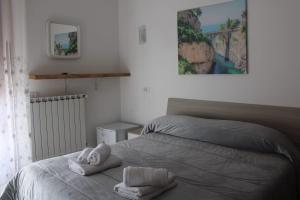 Ένα ή περισσότερα κρεβάτια σε δωμάτιο στο Bed & Breakfast Il Sentiero