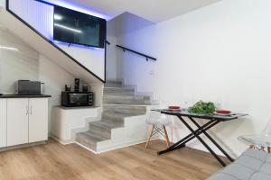 Kuchyň nebo kuchyňský kout v ubytování Duplex Sonemar Pool