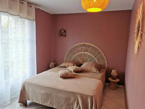 Postel nebo postele na pokoji v ubytování BIENVENUE CHEZ NOUS