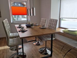 Posezení v ubytování Apartment Kapellenblick + 19 fotografií
