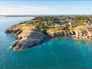 an aerial view of a small island in the water at Appartement indépendant à 500 mètres de la mer in Saint-Gildas-de-Rhuys