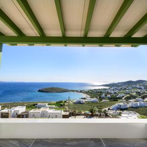 a view of the ocean from a building at Veranta Me Thea in Agios Ioannis