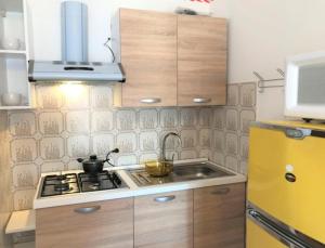 A kitchen or kitchenette at Beautiful Apartment with Sea View - Including Beach Place by Beahost Rentals Még 19 kép