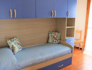 A bed or beds in a room at Beautiful Apartment with Sea View - Including Beach Place by Beahost Rentals