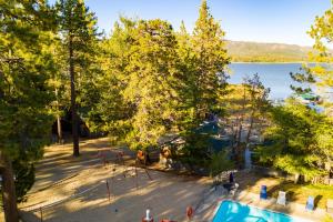 an aerial view of a playground next to a lake at Little Pines Couples Lakeside Cabin by Big Bear Vacations in Big Bear Lake