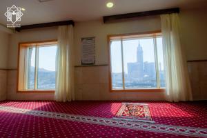 Postel nebo postele na pokoji v ubytování Manarat Gaza Hotel - Al Haram Tower
