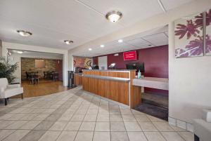 a lobby of a hospital with a waiting room at Red Roof Inn Greensboro Airport in Greensboro