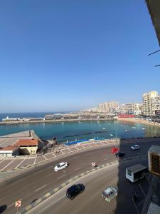 a view of a city with cars parked on a street at gleem alexandria in Alexandria