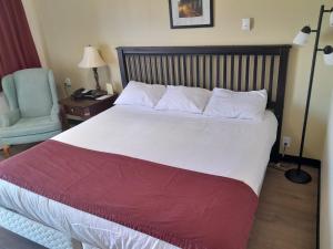 Postel nebo postele na pokoji v ubytování Travellers Motel