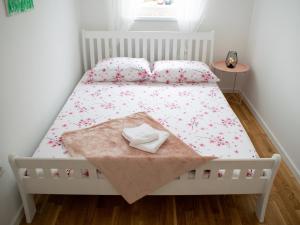 Llit o llits en una habitació de An apartment M & K - 70 m2