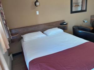 Postel nebo postele na pokoji v ubytování Travellers Motel