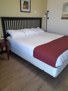 Postel nebo postele na pokoji v ubytování Travellers Motel