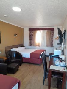 Postel nebo postele na pokoji v ubytování Travellers Motel