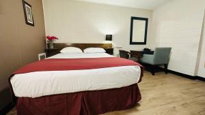 Postel nebo postele na pokoji v ubytování Travellers Motel