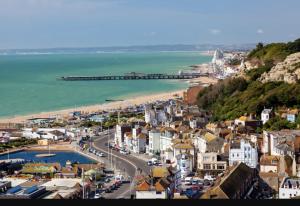 a view of a town with a beach and a pier at 3 Bedroom Heaven Home ll Summerhouse in Hastings
