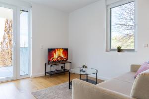 Posezení v ubytování living TIMELESS - Adler Apartments Sasbachwalden