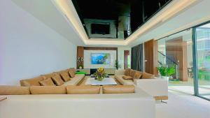 Posezení v ubytování Aria Resort S9 - Hoàng My Villa