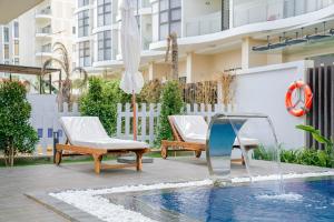 Bazén v ubytování Aria Resort S9 - Hoàng My Villa nebo v jeho okolí + 27 fotografií