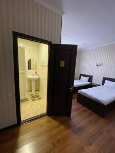 Postel nebo postele na pokoji v ubytování Guest house VOYAGE