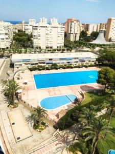 Swimmingpoolen hos eller tæt på Acogedor Bungalow - Club del Mar
