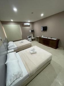 Cama ou camas em um quarto em Hostal EL Prado
