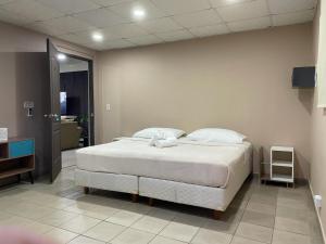 Cama ou camas em um quarto em Hostal EL Prado