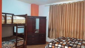 Postel nebo postele na pokoji v ubytování SANPE Apartment