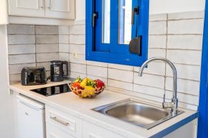 A kitchen or kitchenette at Corali Studios