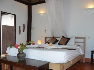 Postel nebo postele na pokoji v ubytování Mealea Resort