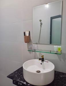 Koupelna v ubytování Maria Hotel