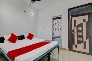 Łóżko lub łóżka w pokoju w obiekcie OYO Flagship 81391 Hotel City Point