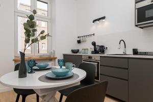 Η κουζίνα ή μικρή κουζίνα στο Apartament blisko Dworca