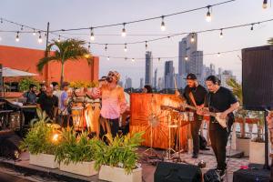 a group of people playing music at an outdoor event at Selina Cartagena in Cartagena de Indias