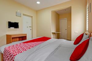 Letto o letti in una camera di Super Hotel O Indra Suites