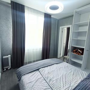 Posteľ alebo postele v izbe v ubytovaní Apartments in Chakvi