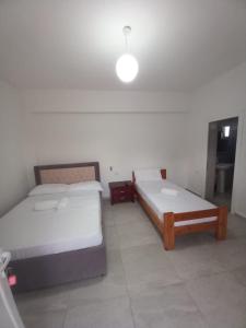 Voodi või voodid majutusasutuse VILLA SILVI KSAMiL toas