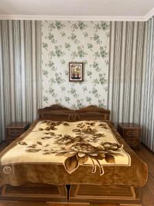 Postel nebo postele na pokoji v ubytování Guesthouse _ DAVITI