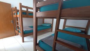 Palanda nebo palandy na pokoji v ubytování Wijaya Hostel